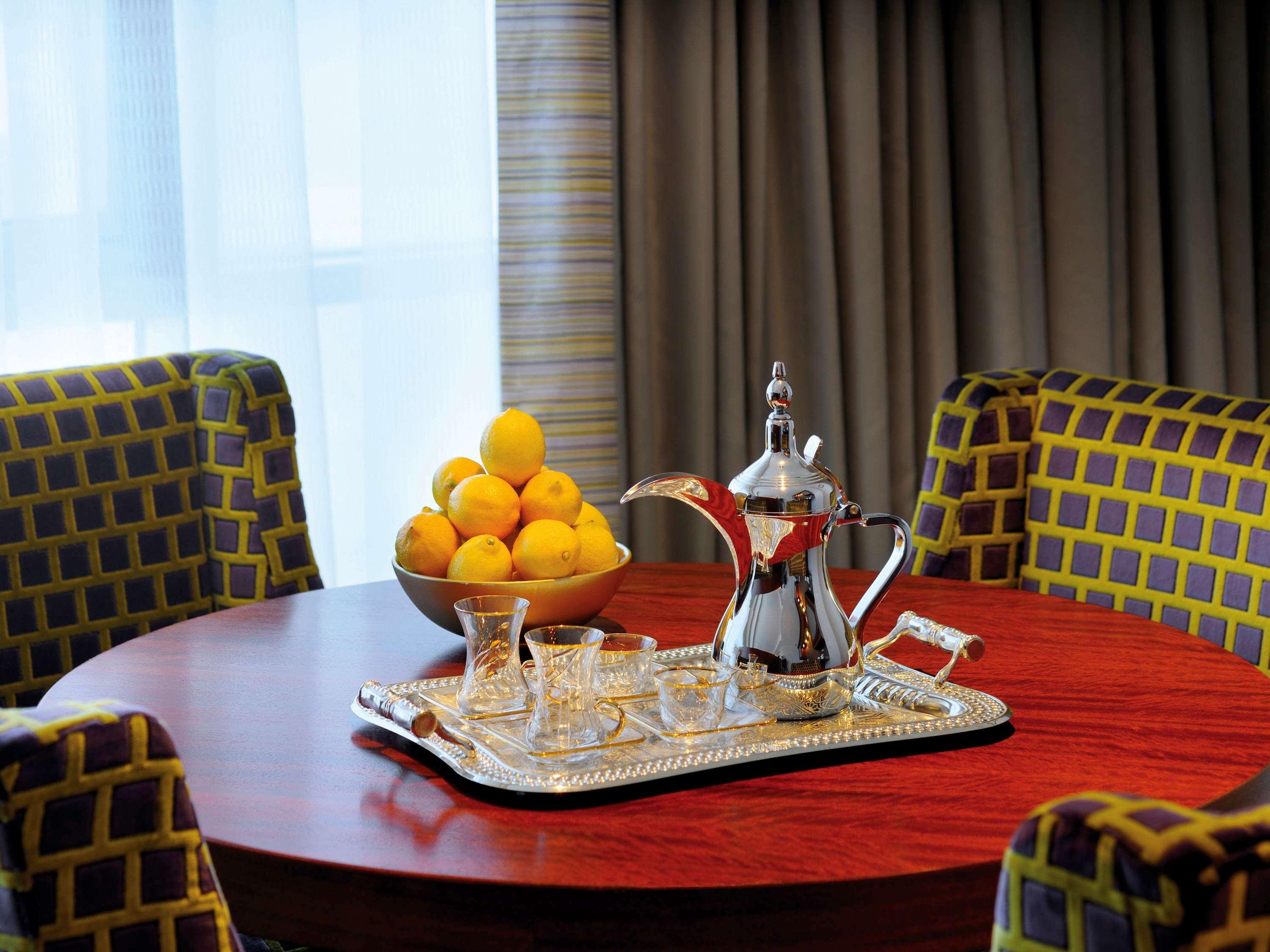 Qabila Westbay Hotel By Marriott Doha Exterior photo A traditional Arabic coffee pot