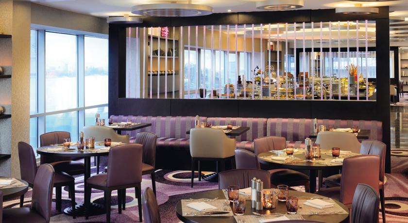 Qabila Westbay Hotel By Marriott Doha Exterior photo The interior of the restaurant