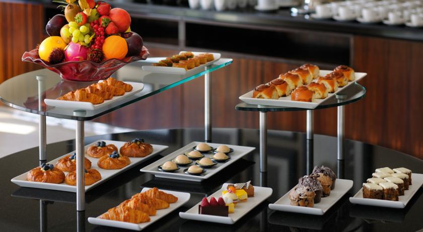 Qabila Westbay Hotel By Marriott Doha Exterior photo A selection of pastries